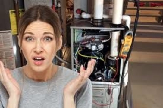 frustrated woman with broken furnace