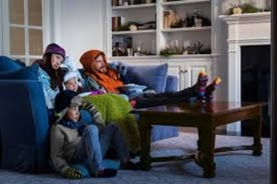 cold family watching tv